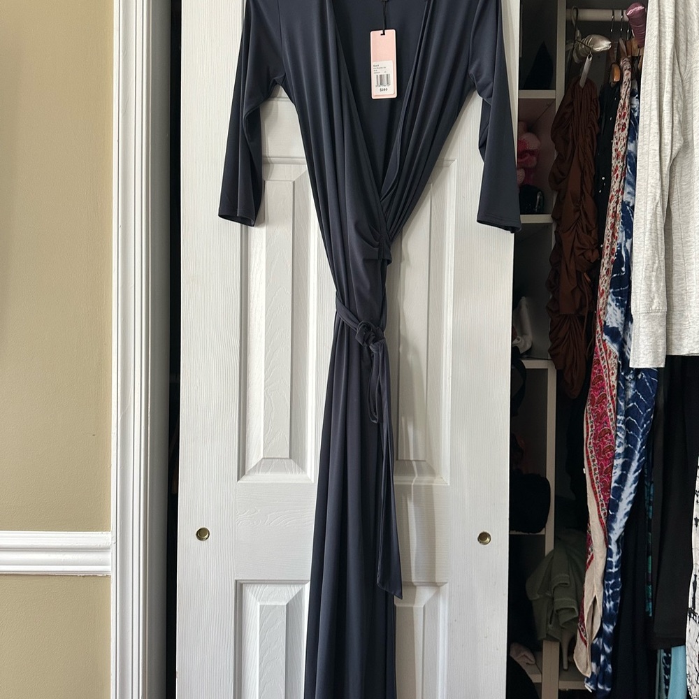 Elegant Navy Wrap Dress. Size 12. Tag says 8. Fits somewhere in between.
